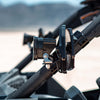 Cuero Race UTV Side Mirror mounted on a Can-Am Maverick X3 UTV roll cage